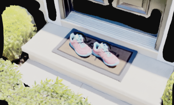 Worn shoes by door.